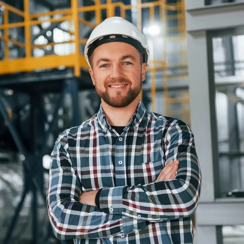 posing-for-camera-construction-worker-in-uniform-i-7PPAUYZ